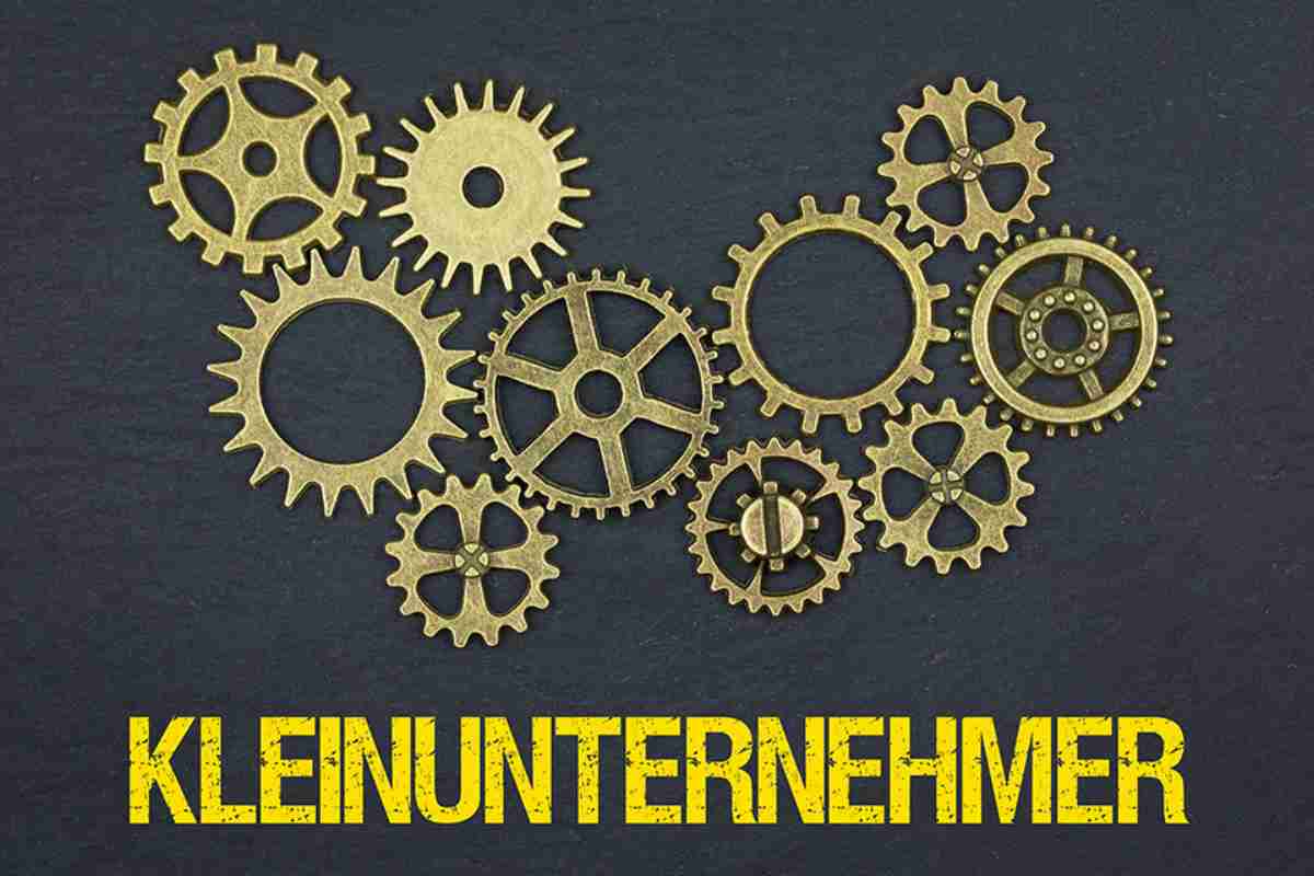 Zahnräder und Schriftzug Kleinunternehmer
